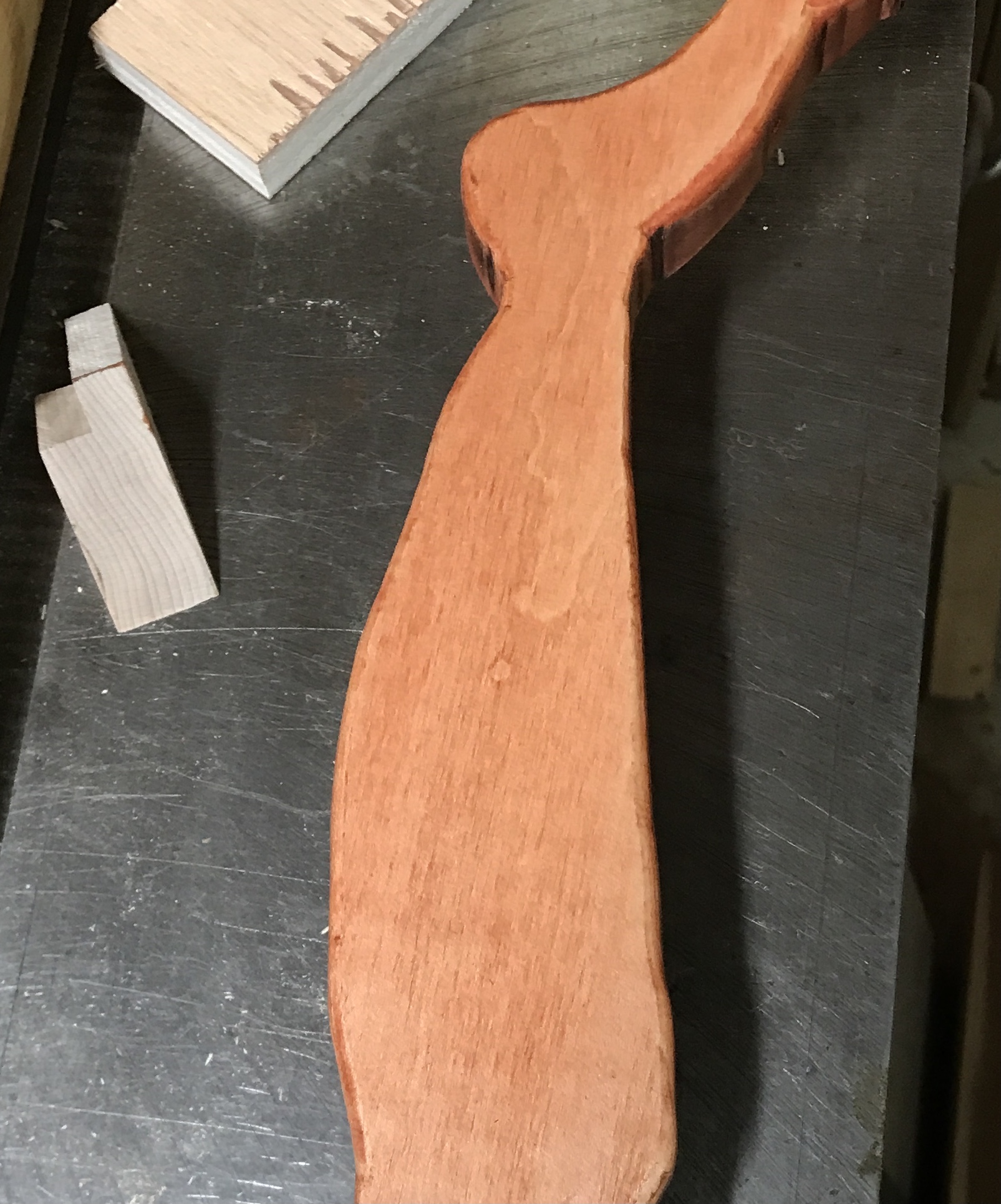 One maple leg stained red